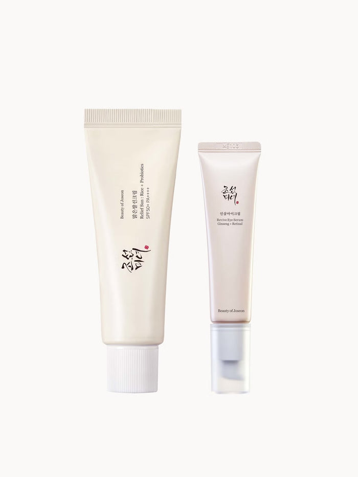 Beauty of Joseon Essentials Duo skin care set with serum and moisturizer bottles, featuring traditional Korean-inspired packaging.