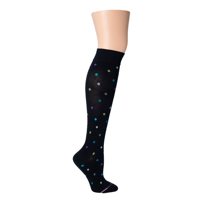 Knee-high black compression socks with colorful polka dots and a solid black cuff.