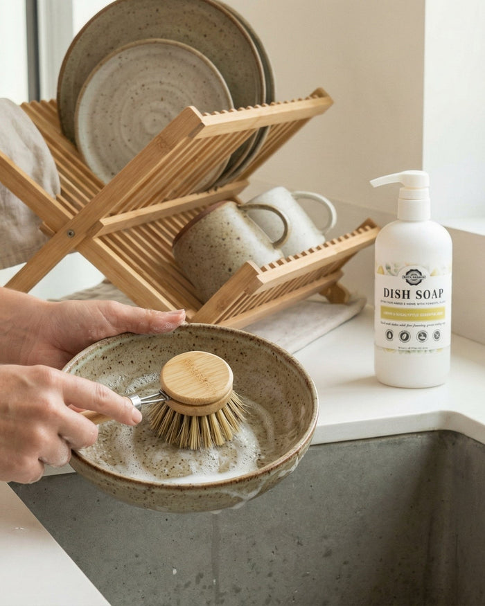 Rustic Strength, Dish Soap, Person washing dishes using Lemon Eucalyptus Dish Soap.