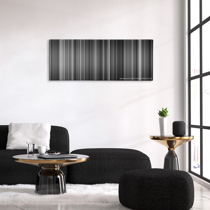 Hara-Kiri color palette canvas above a black sofa with a gold-topped table
