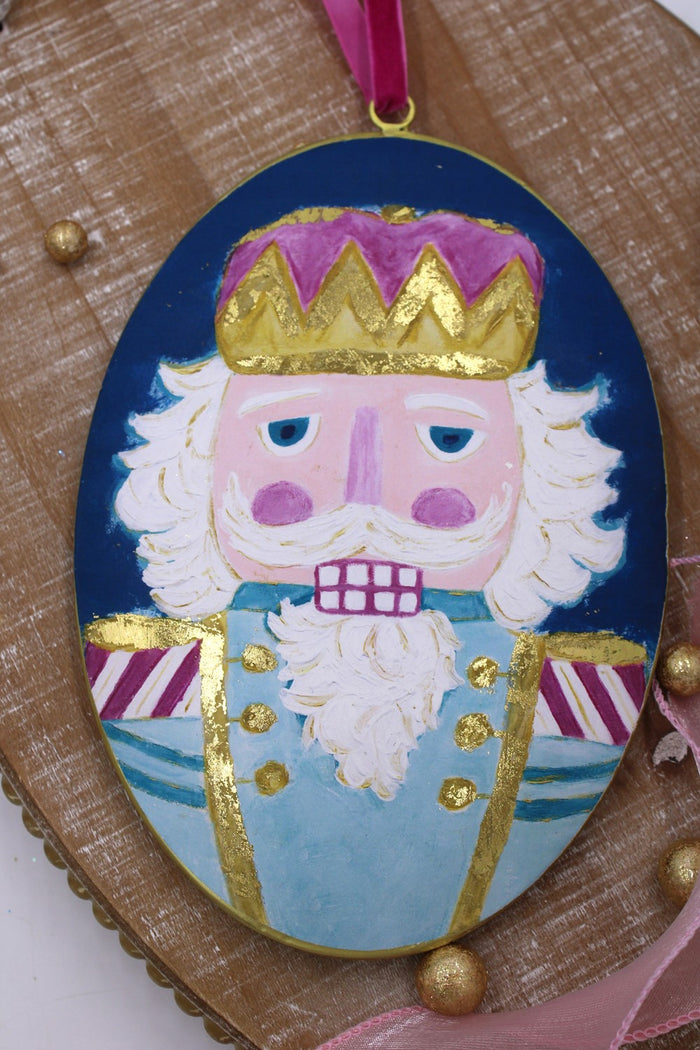 Large Nutcracker Oval Metal Disc Ornament