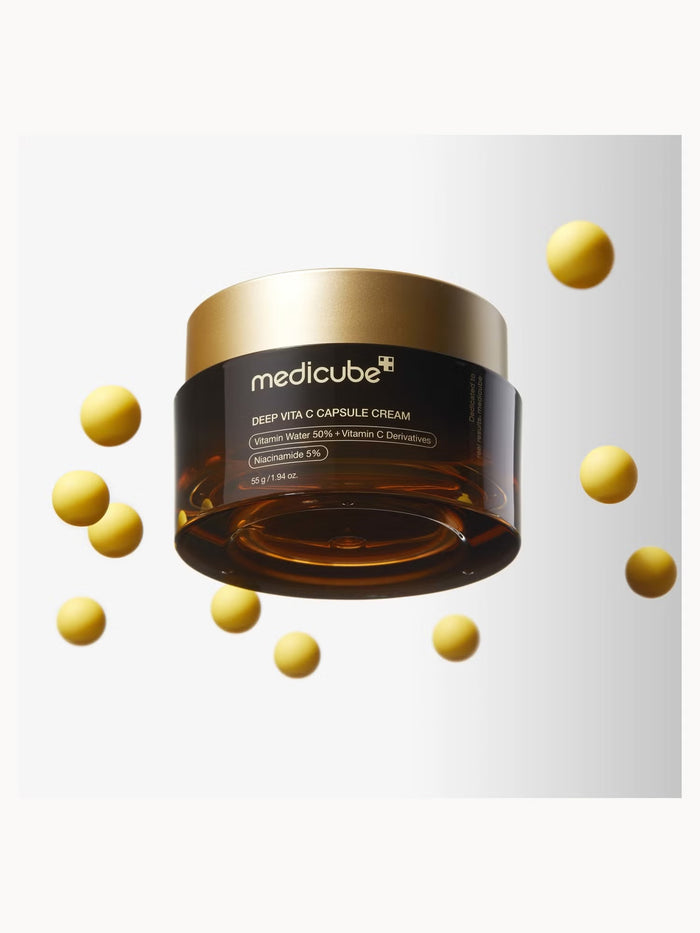Medicube Deep Vita C Capsule Cream 55g face cream with brightening orange capsules and smooth, hydrating texture.