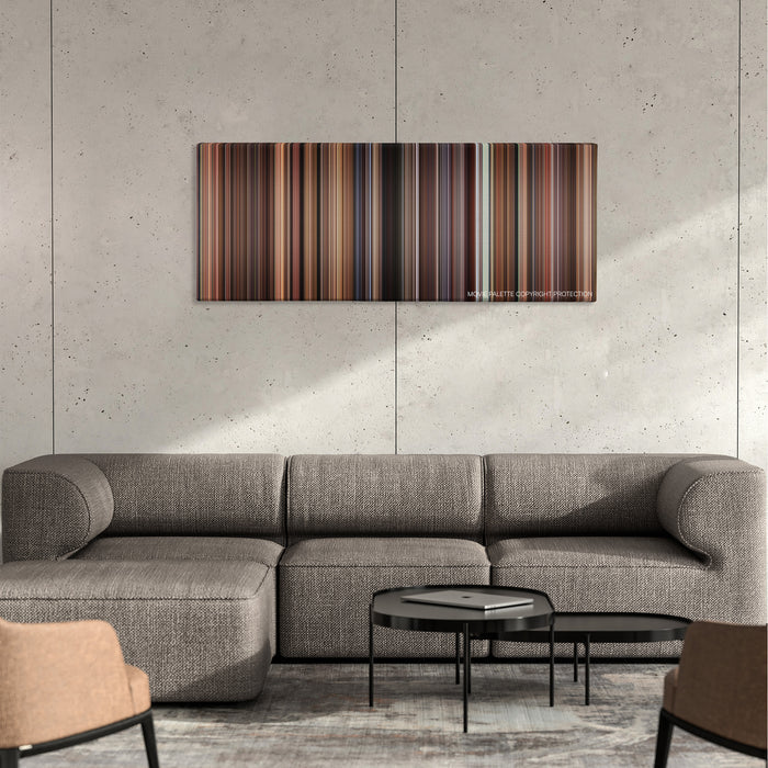 Mona Lisa Smile color palette canvas on a concrete wall above a gray sectional sofa