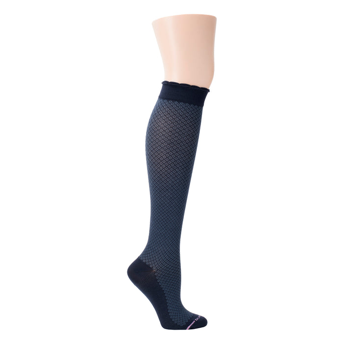Knee-high compression socks in navy with a diamond pattern and scalloped top.