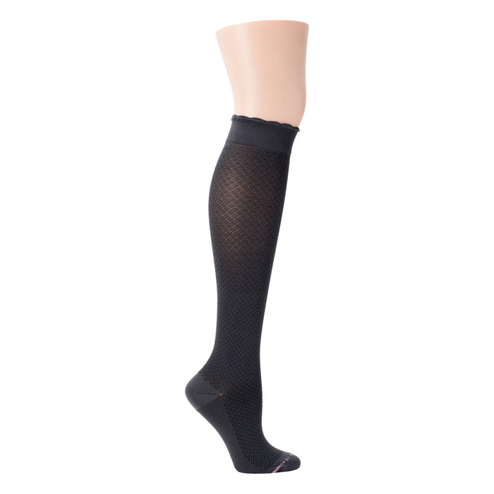 Knee-high black compression sock with a textured pattern and scalloped top edge.