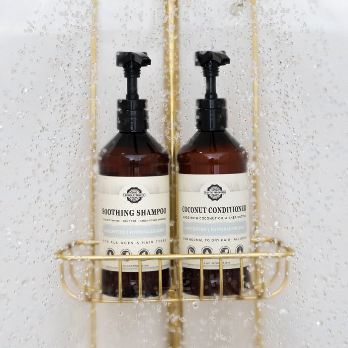 Rustic Strength, Soothing Shampoo and Coconut Conditioner in water droplets