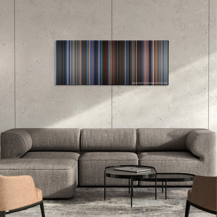 Wag The Dog color palette canvas on a concrete wall above a gray sectional sofa