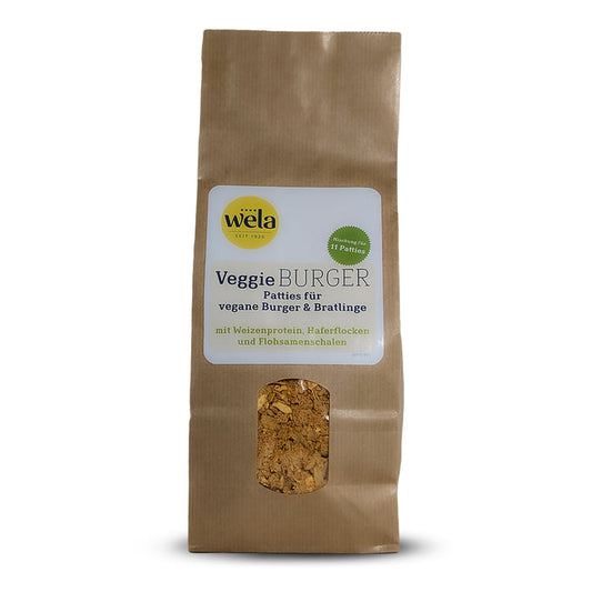 Wela Veggie Burger – brauner Beutel mit Sichtfenster und weißem Etikett mit grüner und blauer Aufschrift.